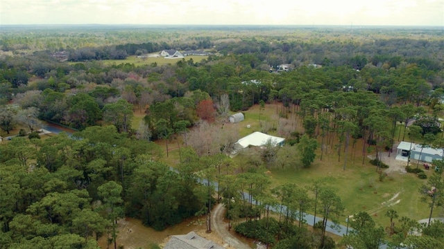 drone / aerial view with a view of trees