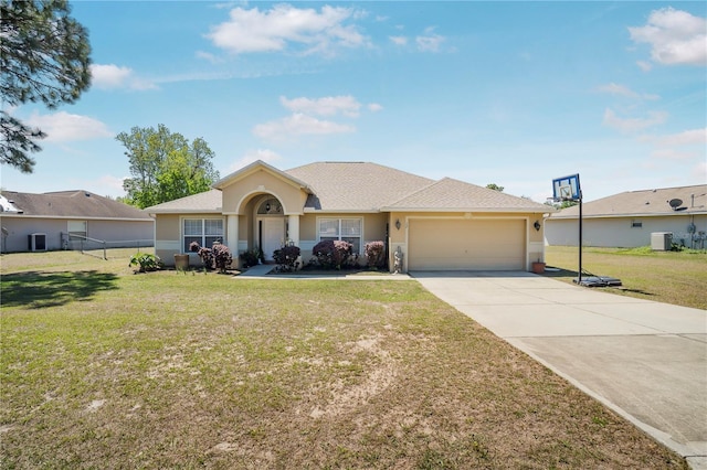 ranch-style home featuring driveway, a garage, a front lawn, and stucco siding