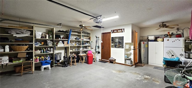 garage featuring a garage door opener, freestanding refrigerator, water heater, and a ceiling fan