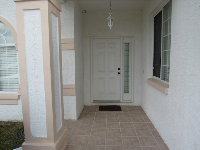 2459 NW 55th Avenue Rd, Ocala, FL 34482 - doorway to property featuring stucco siding