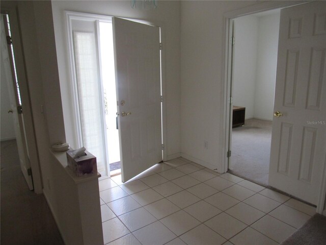 2459 NW 55th Avenue Rd, Ocala, FL 34482 - entryway with light tile patterned floors
