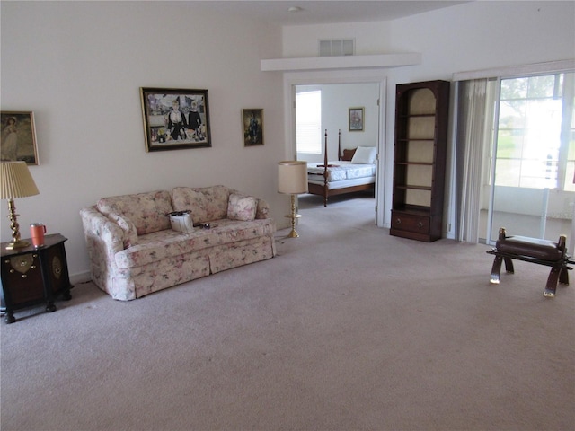 2459 NW 55th Avenue Rd, Ocala, FL 34482 - carpeted living area featuring visible vents