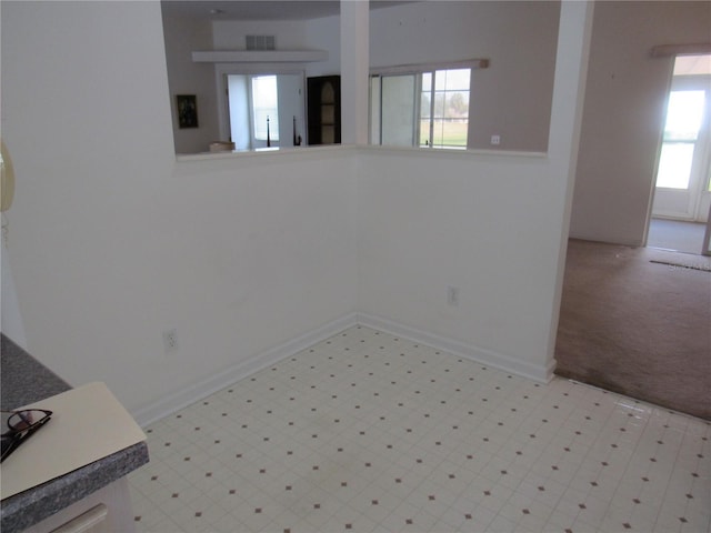 2459 NW 55th Avenue Rd, Ocala, FL 34482 - empty room featuring baseboards, visible vents, and light floors
