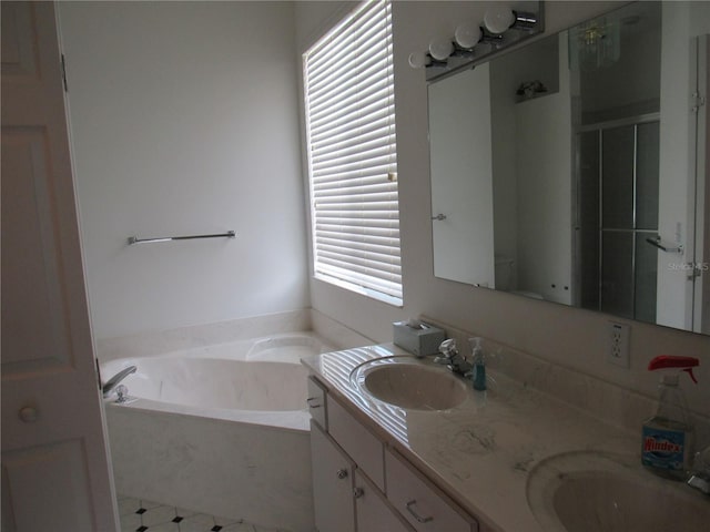 2459 NW 55th Avenue Rd, Ocala, FL 34482 - full bathroom with a bath, double vanity, and a sink