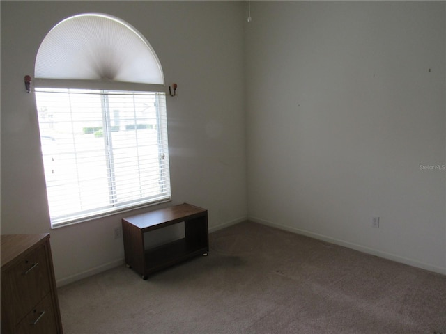 2459 NW 55th Avenue Rd, Ocala, FL 34482 - unfurnished room featuring light carpet and baseboards