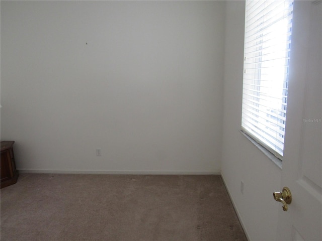 2459 NW 55th Avenue Rd, Ocala, FL 34482 - unfurnished room featuring light carpet and baseboards