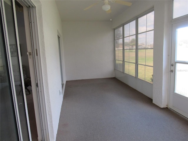 2459 NW 55th Avenue Rd, Ocala, FL 34482 - unfurnished sunroom featuring ceiling fan