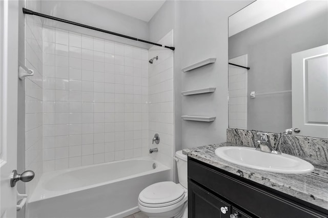 full bath featuring shower / bathing tub combination, vanity, and toilet