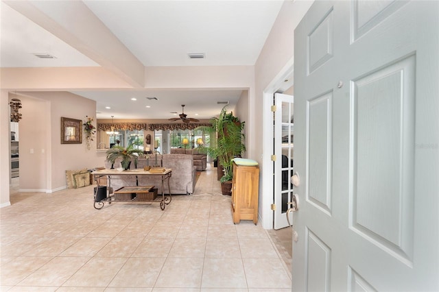 foyer with ceiling fan, light tile patterned flooring, recessed lighting, visible vents, and baseboards