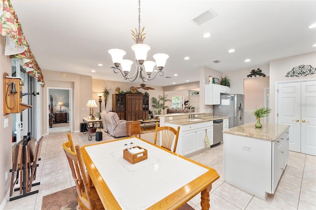 dining area with recessed lighting, visible vents, an inviting chandelier, and light tile patterned flooring