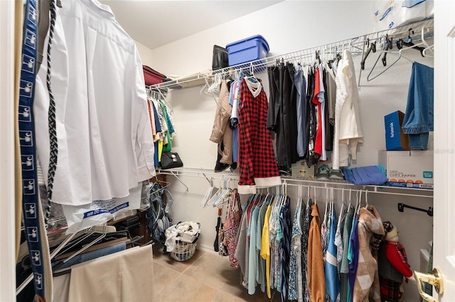 walk in closet featuring tile patterned floors