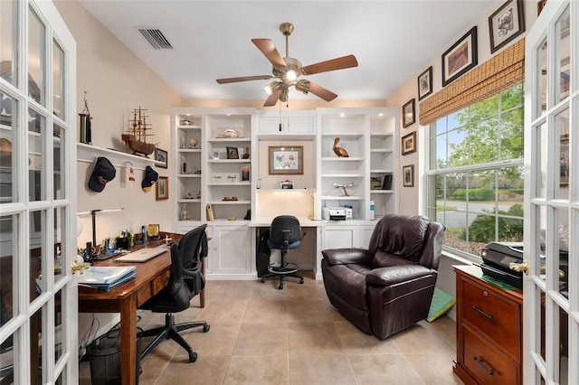 office area with ceiling fan, french doors, light tile patterned flooring, and visible vents