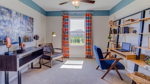 home office featuring a ceiling fan, carpet, and baseboards