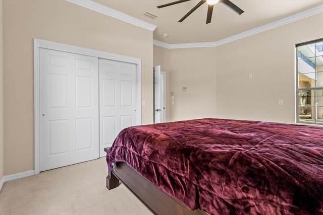 bedroom featuring crown molding, visible vents, carpet flooring, ceiling fan, and baseboards