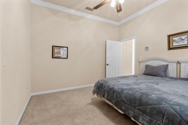 bedroom featuring visible vents, baseboards, ceiling fan, crown molding, and carpet flooring