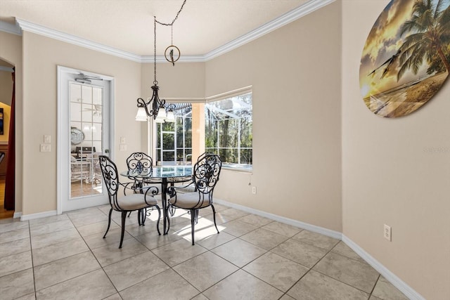 dining area featuring a chandelier, crown molding, baseboards, and light tile patterned floors