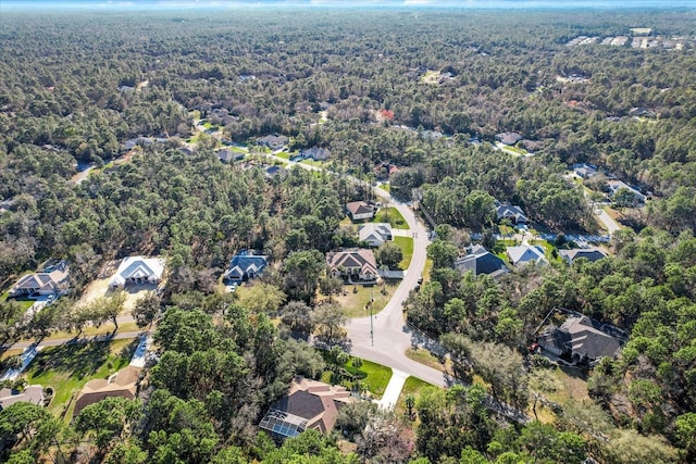 aerial view featuring a residential view and a forest view