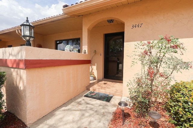 3447 SW 19th Pl, Ocala, FL 34474 - entrance to property with stucco siding