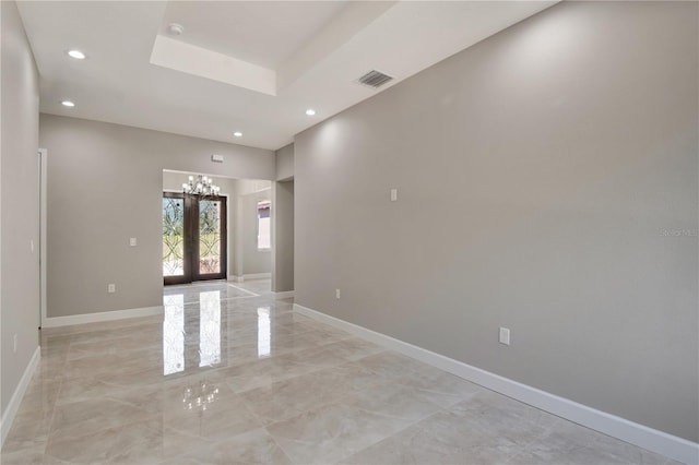 unfurnished room with recessed lighting, french doors, visible vents, and baseboards