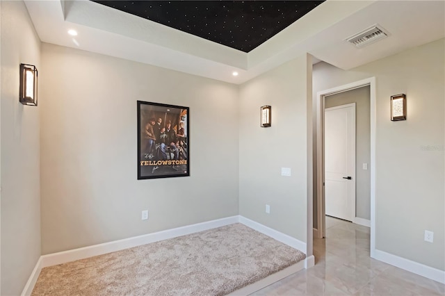 spare room featuring baseboards, visible vents, light colored carpet, and recessed lighting