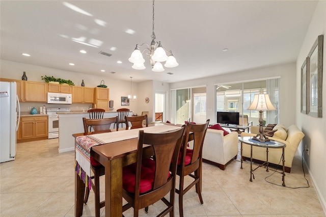 dining space with recessed lighting, visible vents, a chandelier, and light tile patterned flooring