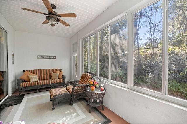 sunroom / solarium with ceiling fan