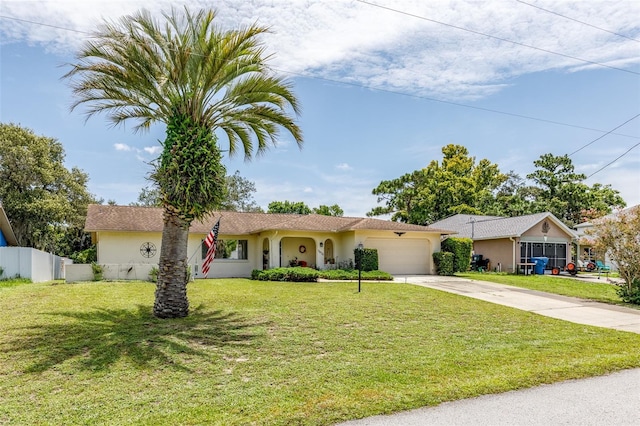 view of front of property featuring an attached garage, a front lawn, concrete driveway, and stucco siding