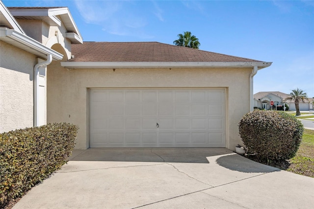 garage with driveway