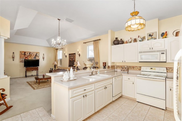 kitchen featuring light colored carpet, white appliances, a sink, visible vents, and open floor plan