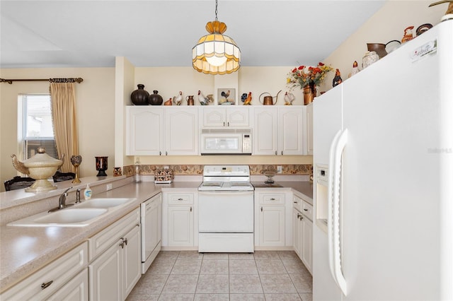 kitchen featuring pendant lighting, white appliances, light tile patterned flooring, and white cabinetry