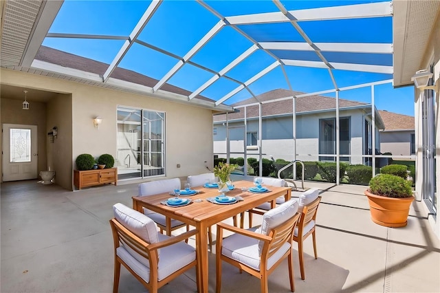 5891 NW 26th St, Ocala, FL 34482 - view of patio with a lanai and outdoor dining area