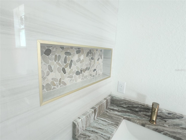 interior details featuring a sink