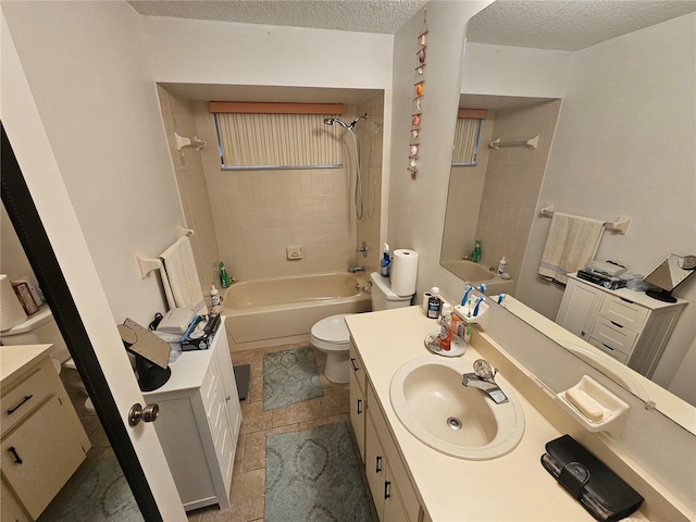 full bath with a textured ceiling, tub / shower combination, vanity, and toilet