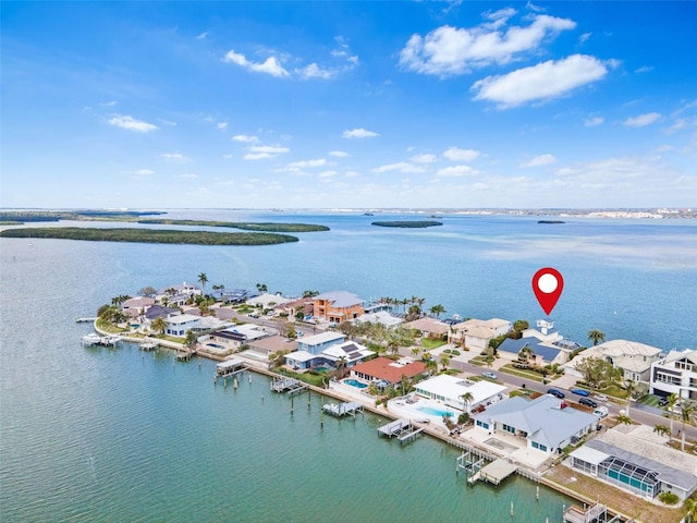 bird's eye view with a residential view and a water view