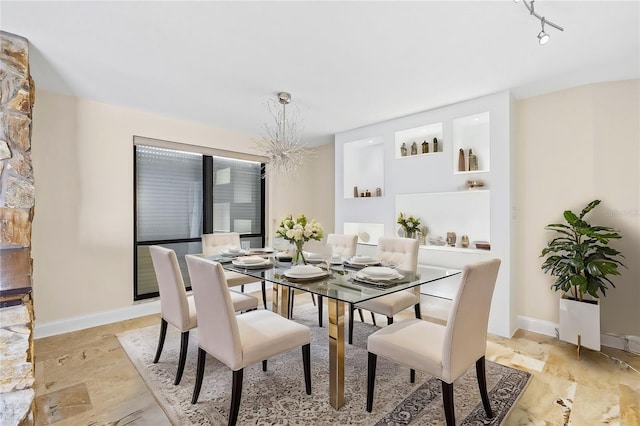 dining space with baseboards