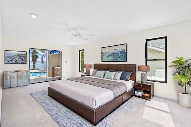 bedroom featuring ceiling fan and access to outside