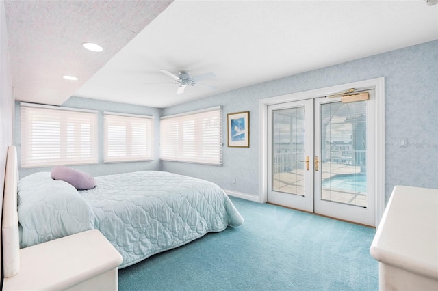 carpeted bedroom with access to exterior, french doors, baseboards, and a ceiling fan