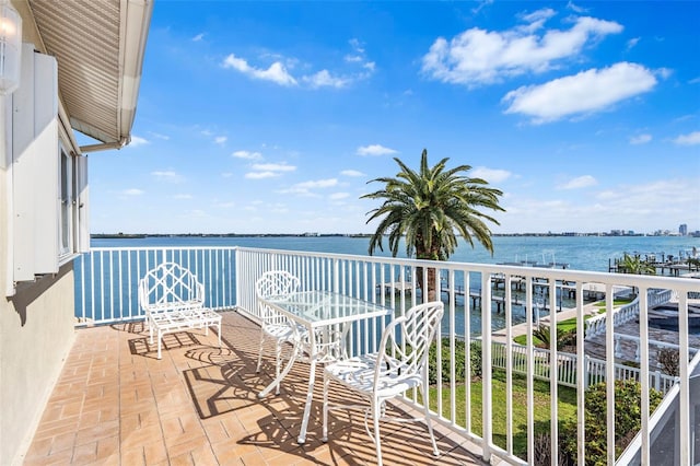 balcony featuring a water view