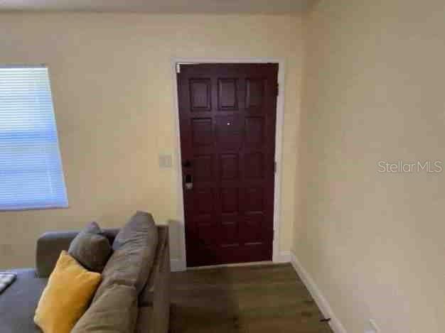 foyer entrance with baseboards