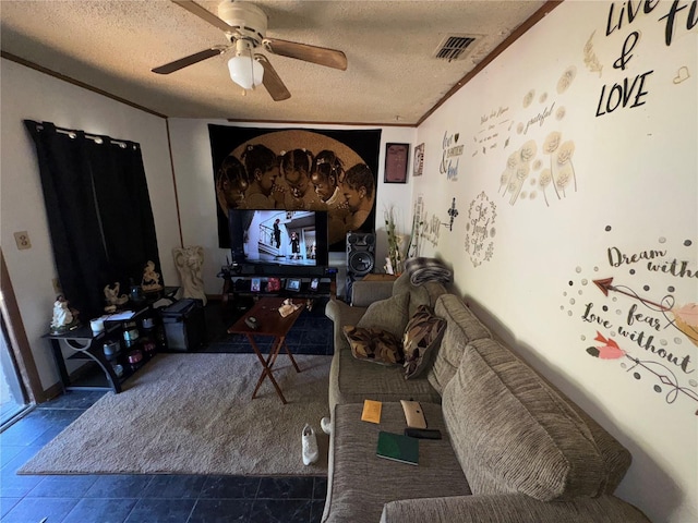 1622 NW 16th St, Ocala, FL 34475 - living room with visible vents, ceiling fan, ornamental molding, a textured ceiling, and tile patterned floors
