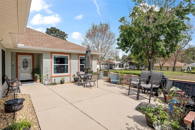 view of patio / terrace with fence