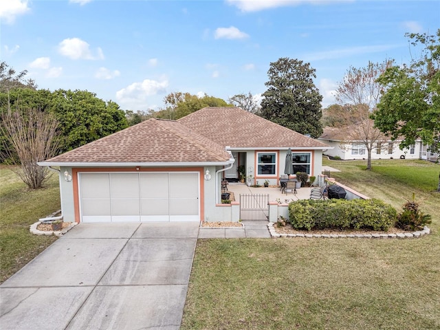 view of front of house featuring driveway, a shingled roof, an attached garage, a front yard, and stucco siding