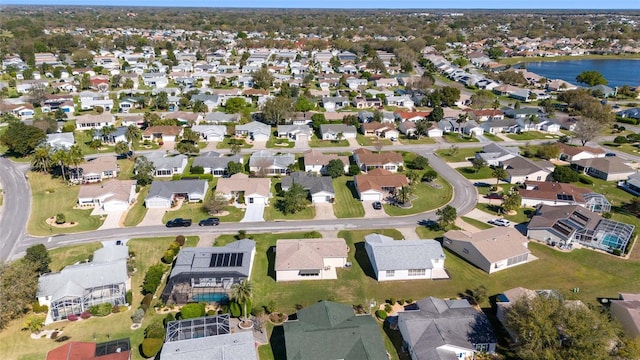 aerial view featuring a water view and a residential view