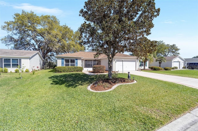 ranch-style home featuring a garage, driveway, and a front yard