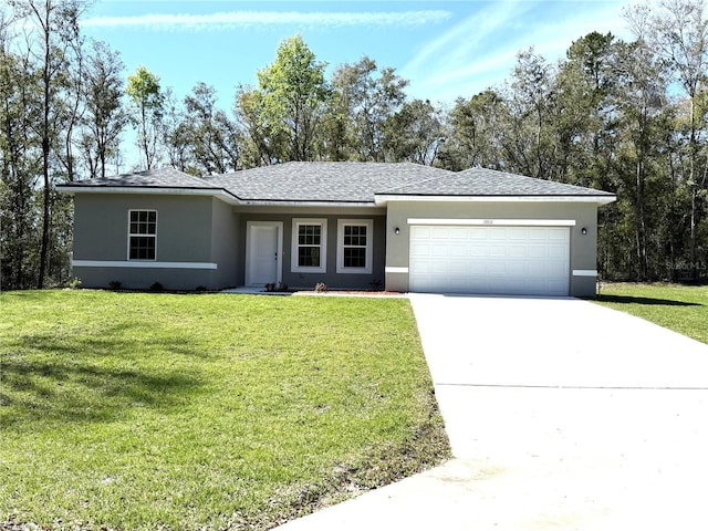 single story home with an attached garage, concrete driveway, roof with shingles, stucco siding, and a front yard