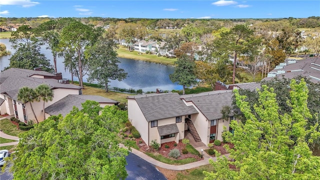 birds eye view of property featuring a residential view and a water view