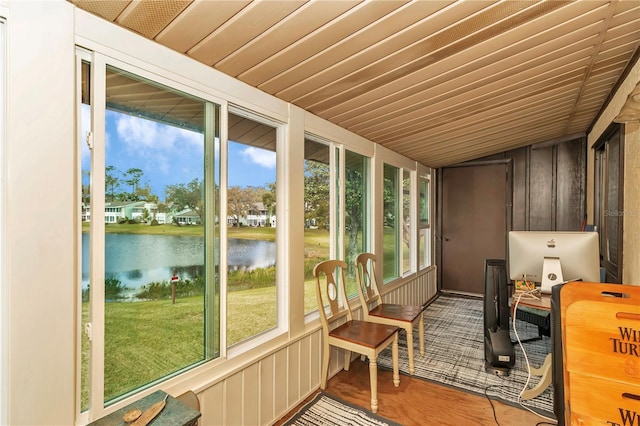 sunroom with wood ceiling and plenty of natural light