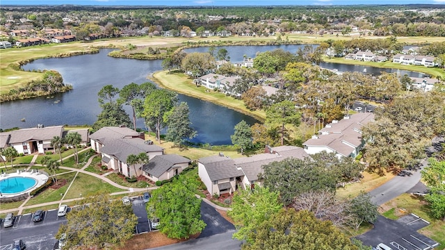 bird's eye view featuring a water view and a residential view