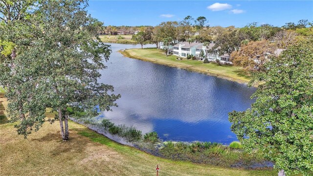 birds eye view of property featuring a water view