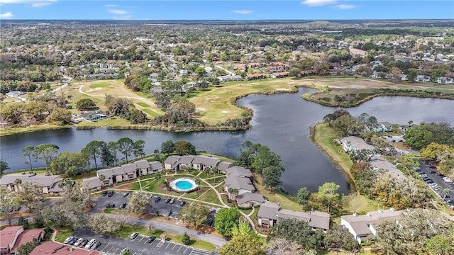 birds eye view of property with a water view and a residential view